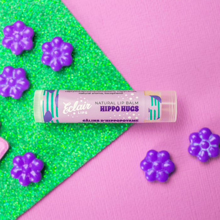 Eclair Lips Hippo Hugs lip balm with purple flower candies