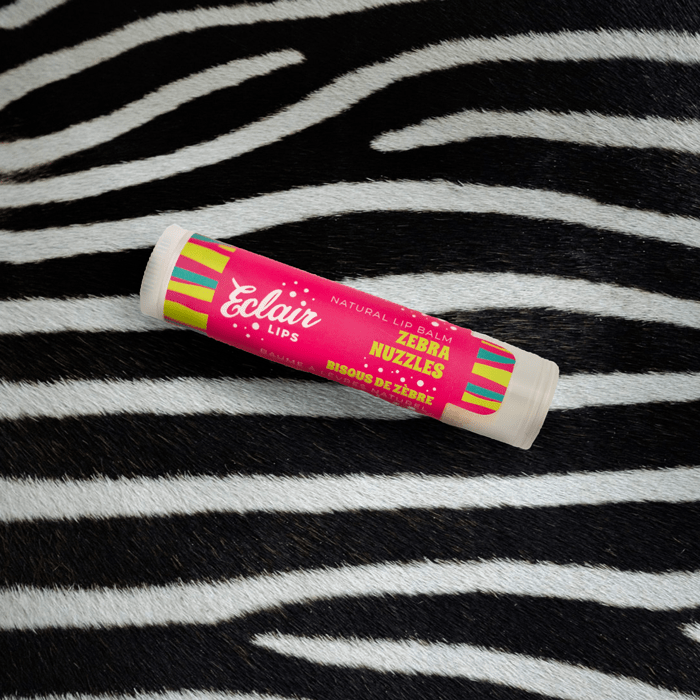 Eclair Lips Zebra Nuzzles lip balm on zebra print